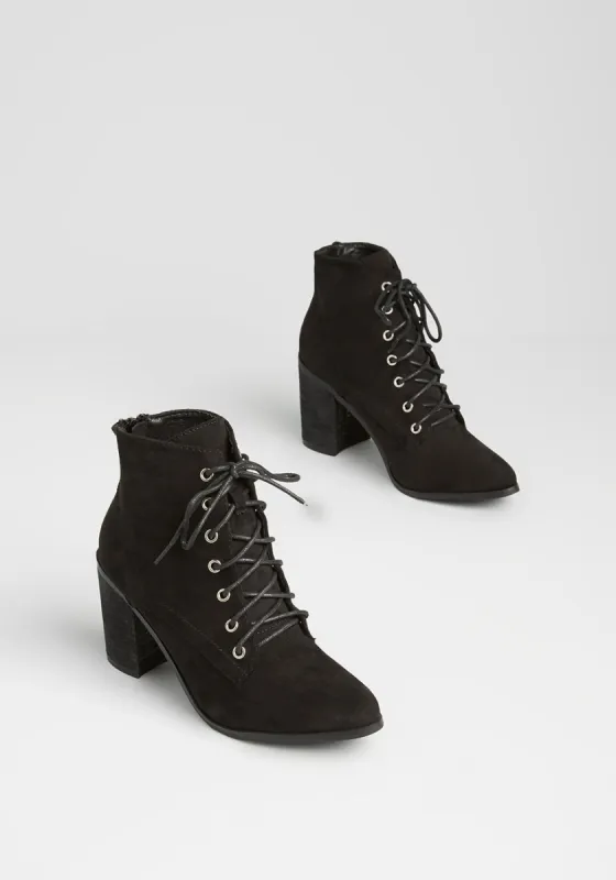 Straight Outta Salem Lace-Up Bootie sold by Modcloth