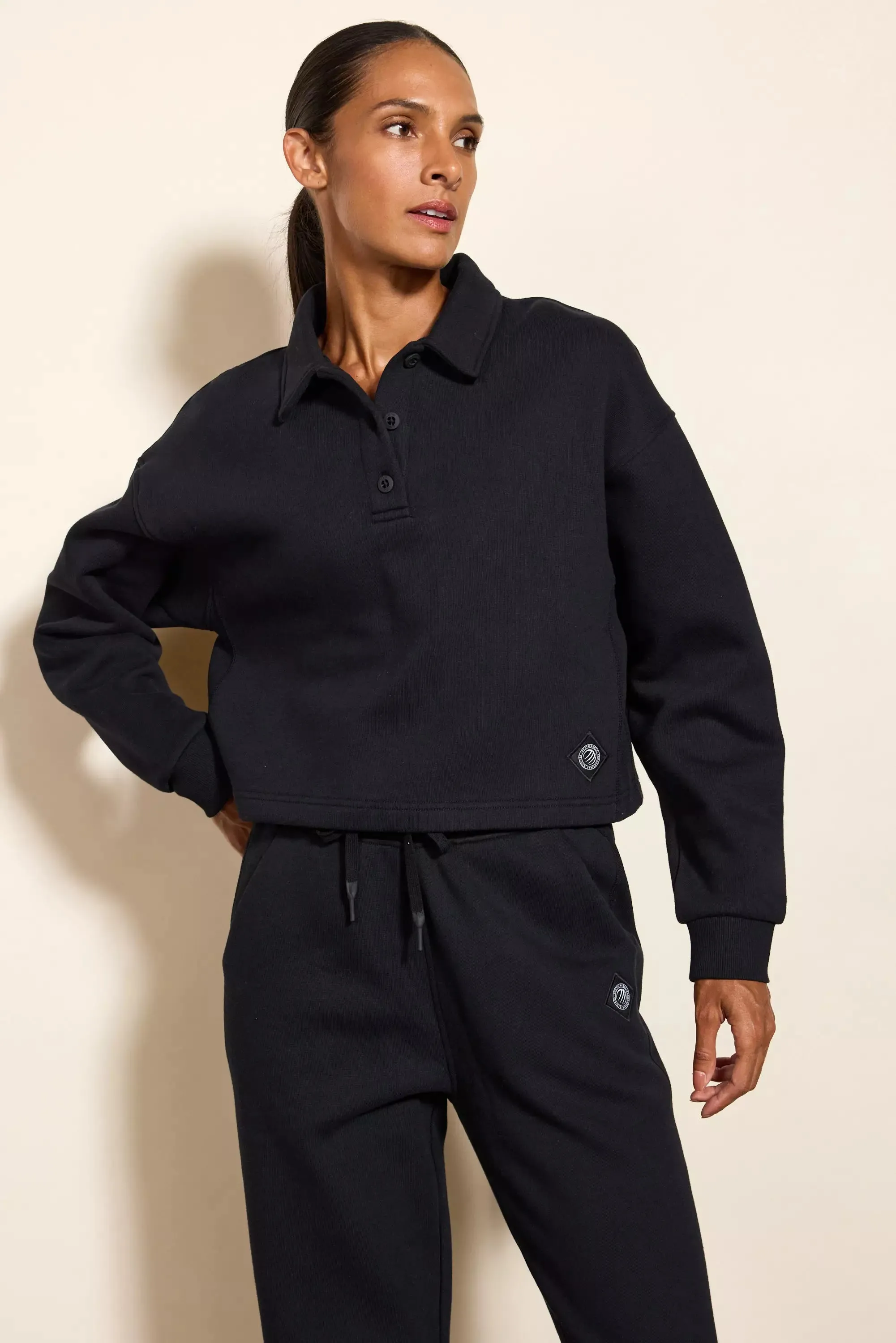 Comfort Fleece Polo - Black sold by MPG