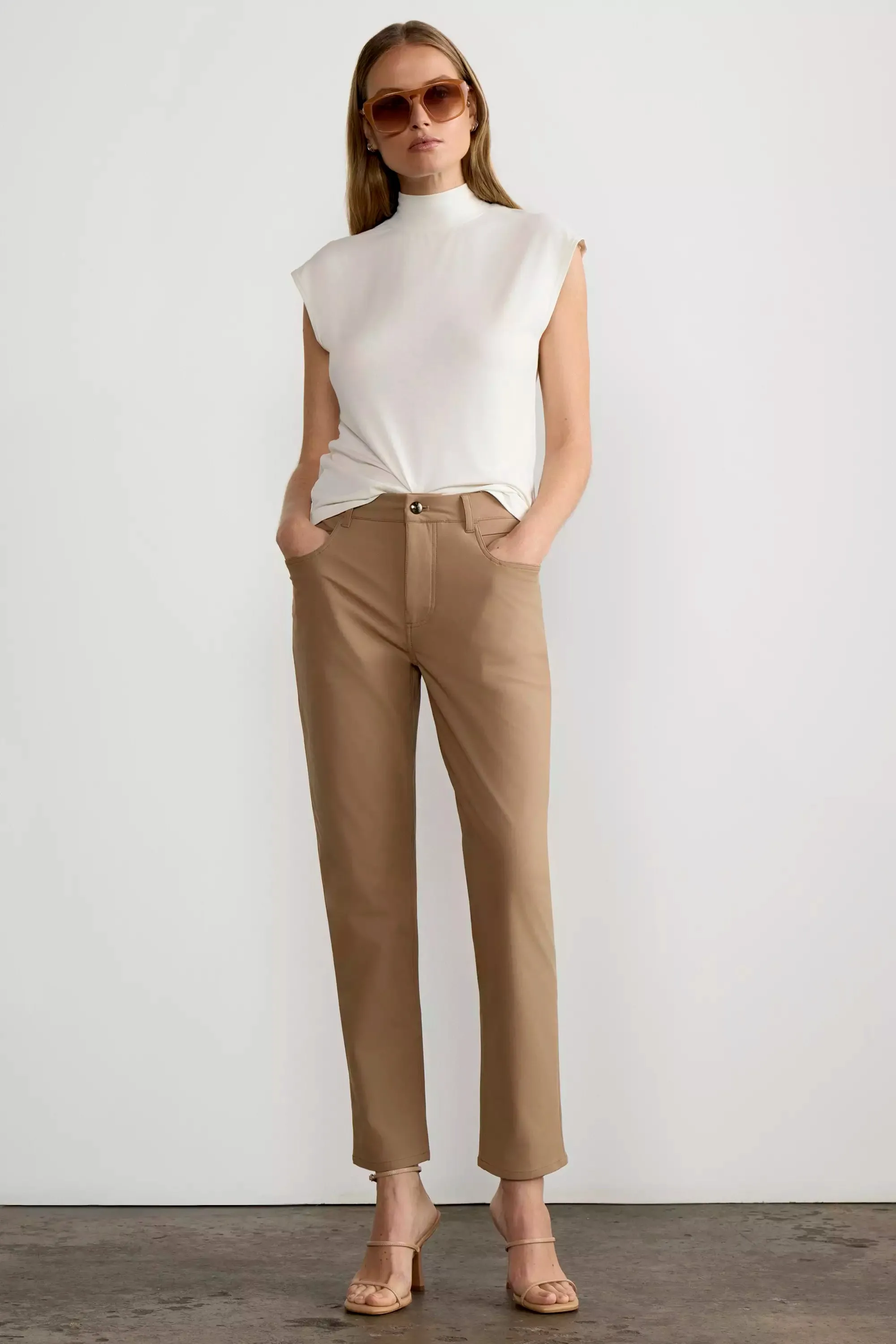 Expression Sleeveless Mock Neck Top sold by Mondetta