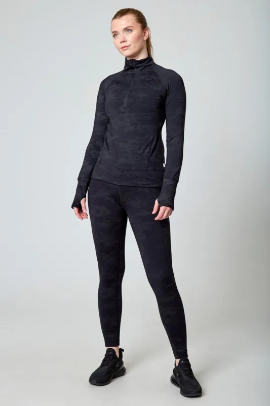 Women’s 1/4 Zip Reflective Cold Gear Top sold by Mondetta