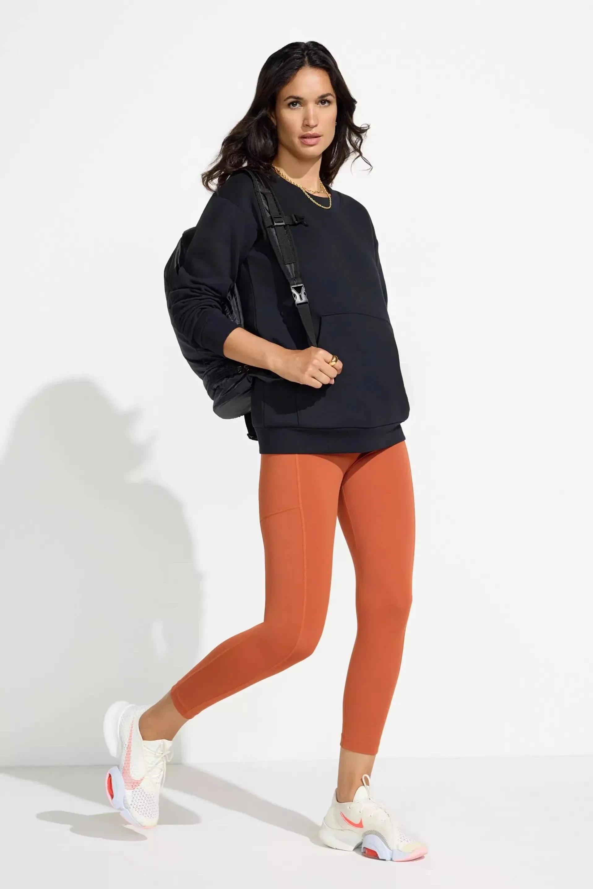 The Active Stretch GRS Certified Recycled Nylon Capri Legging - Terracotta Orange sold by Mondetta