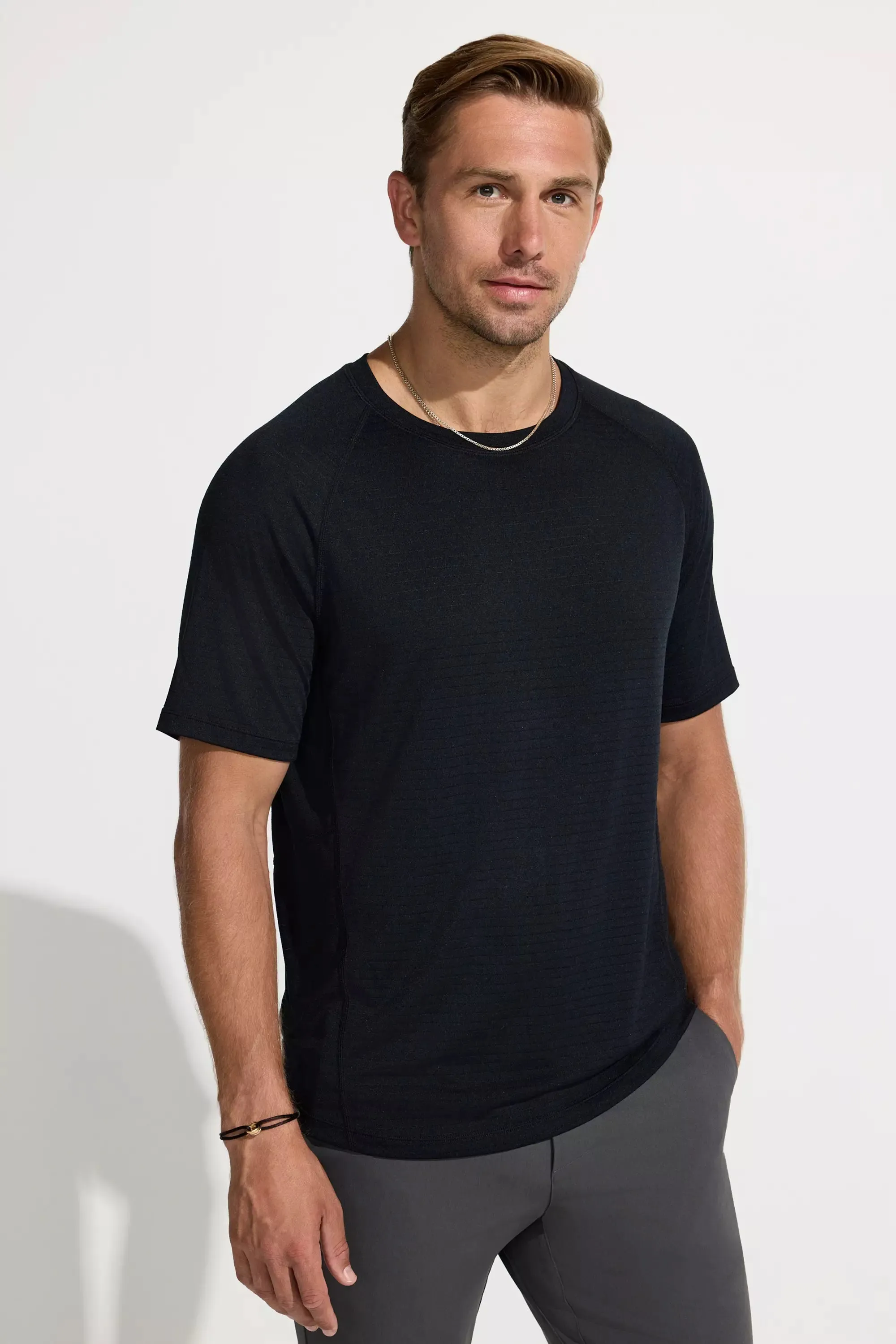 The Active Lightweight GRS Certified Recycled Poly Short Sleeve Tee - Black Solid sold by Mondetta