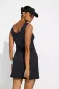 The Built-In Bra and Short GRS Certified Recycled Poly Tennis Dress - Black sold by Mondetta
