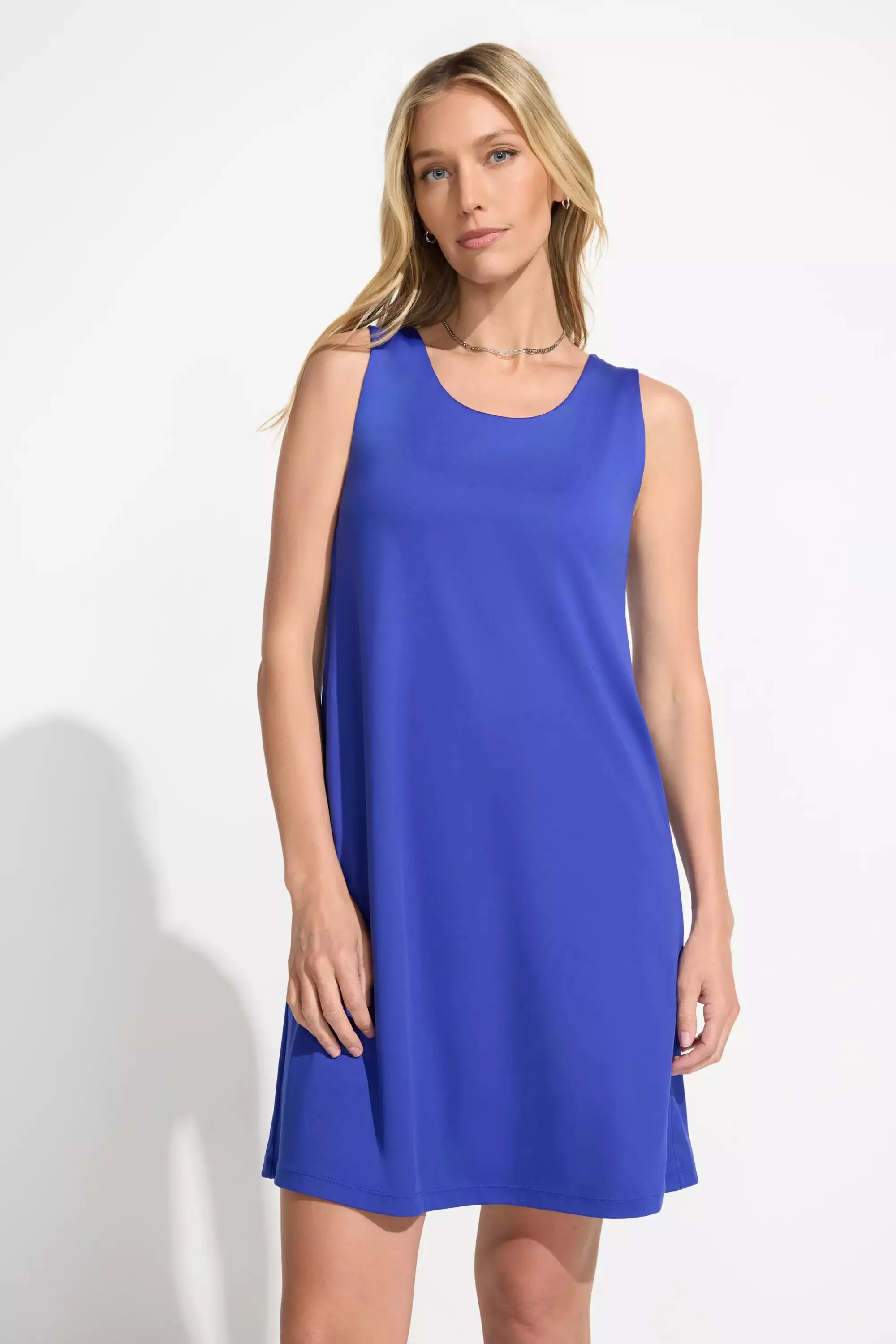 The Built-In Bra and Short GRS Certified Recycled Poly Tennis Dress - Electric Blue sold by Mondetta