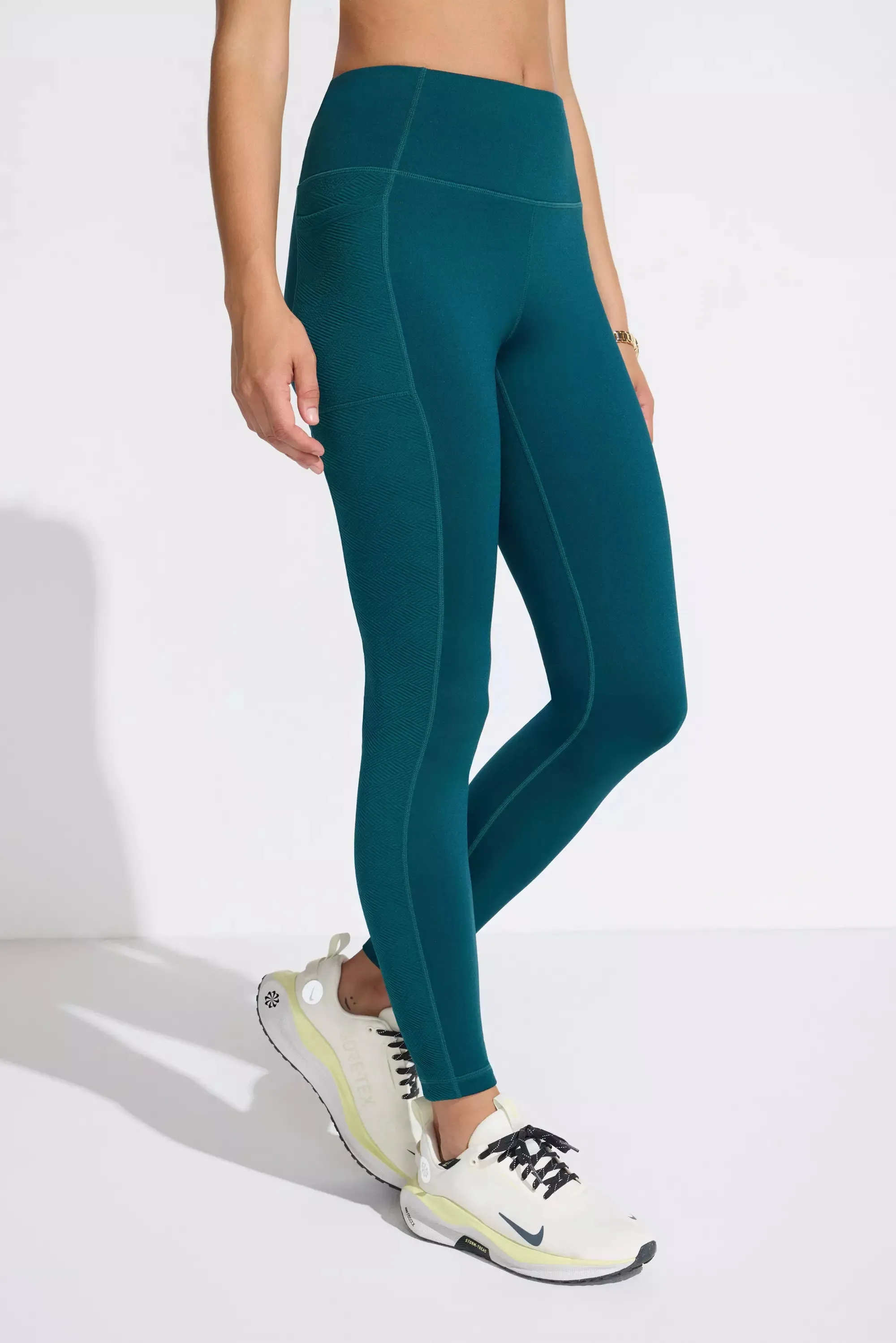 The Jacquard Panel GRS Certified Recycled Poly Legging - Green Teal sold by Mondetta
