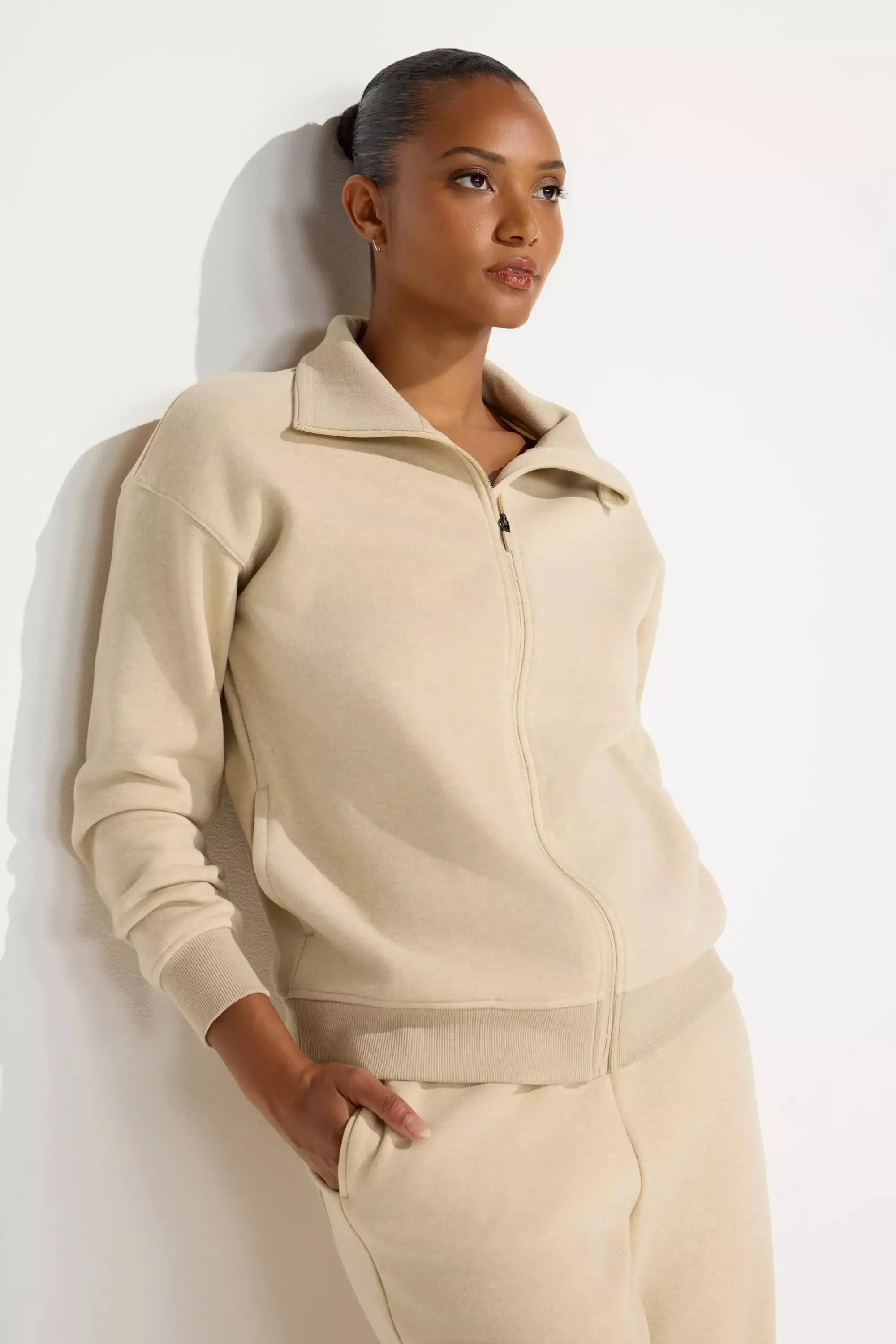 The Soft Warm GRS Certified Recycled Poly Full Zip Top - Irish Cream sold by Mondetta