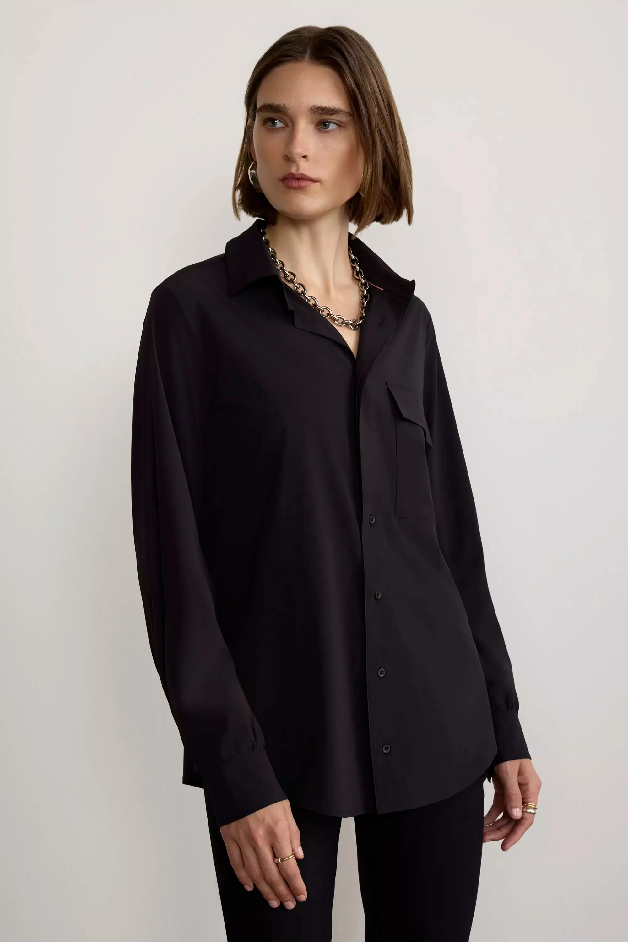 Resource Relaxed Blouse with Pleated Sleeve Cuff Detail - Black sold by Mondetta