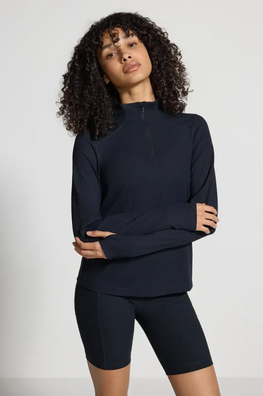 The Active Ribbed GRS Certified Recycled Nylon 1/2 Zip - Black sold by Mondetta