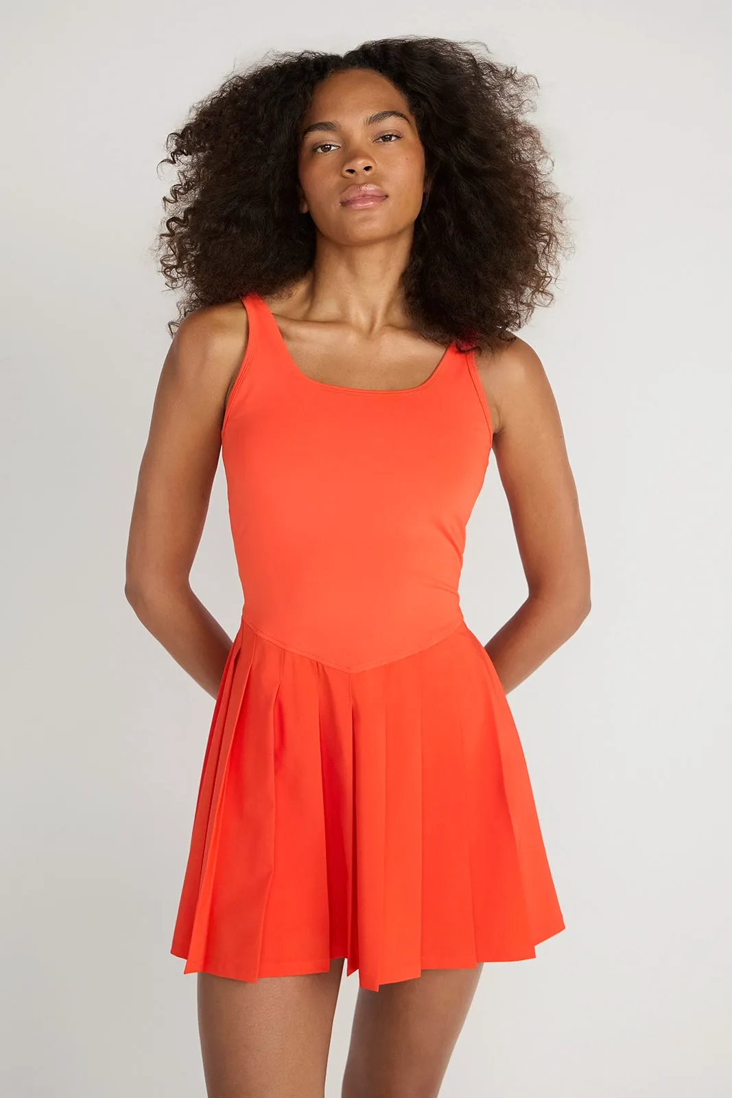 The Breathable GRS Certified Recycled Poly 3-in-1 Tennis Dress - Grenadine sold by Mondetta