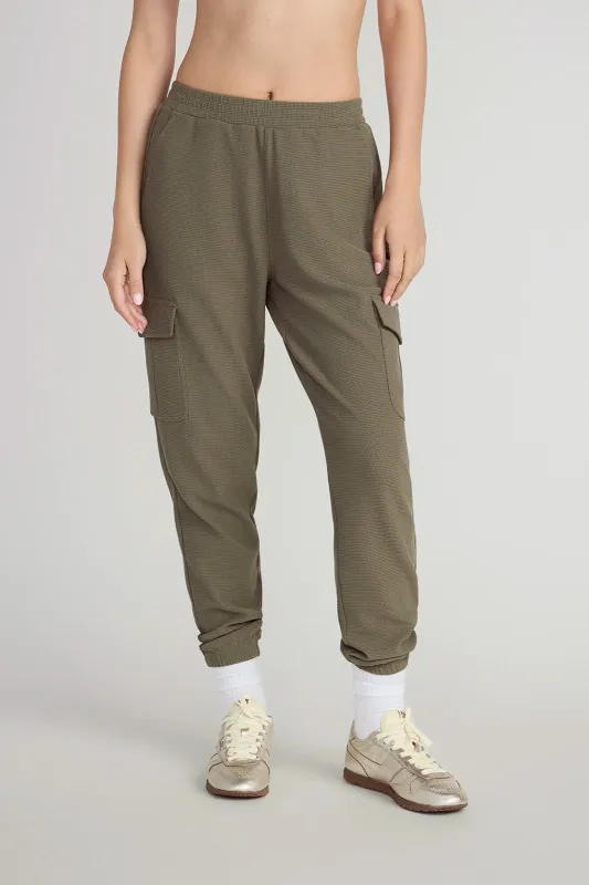 The Light Stretch GRS Certified Recycled Poly Waffle Jogger - Dusty Olive sold by Mondetta