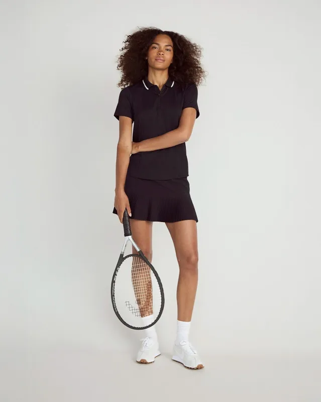 The Pleated Built-In Liner GRS Certified Recycled Poly Skort - Black sold by Mondetta