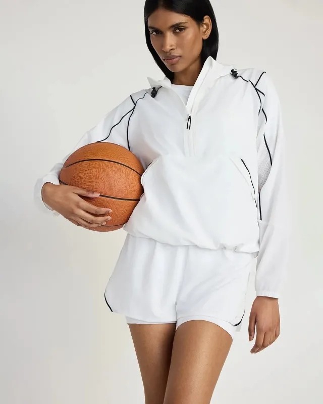 The Built-In Liner GRS Certified Recycled Poly 3.5" Run Short - White/Black sold by Mondetta