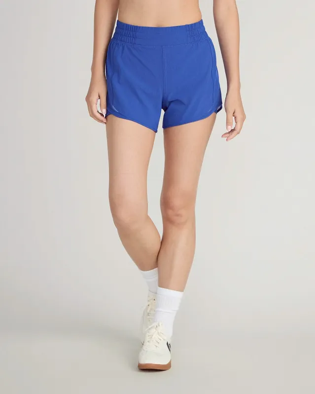 The Built-In Liner GRS Certified Recycled Poly 3.5" Run Mesh Short - Surf The Web Blue sold by Mondetta