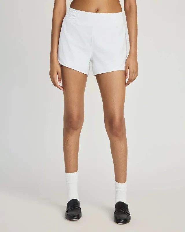 The Built-In Liner GRS Certified Recycled Poly 3.5" Run Mesh Short - White sold by Mondetta