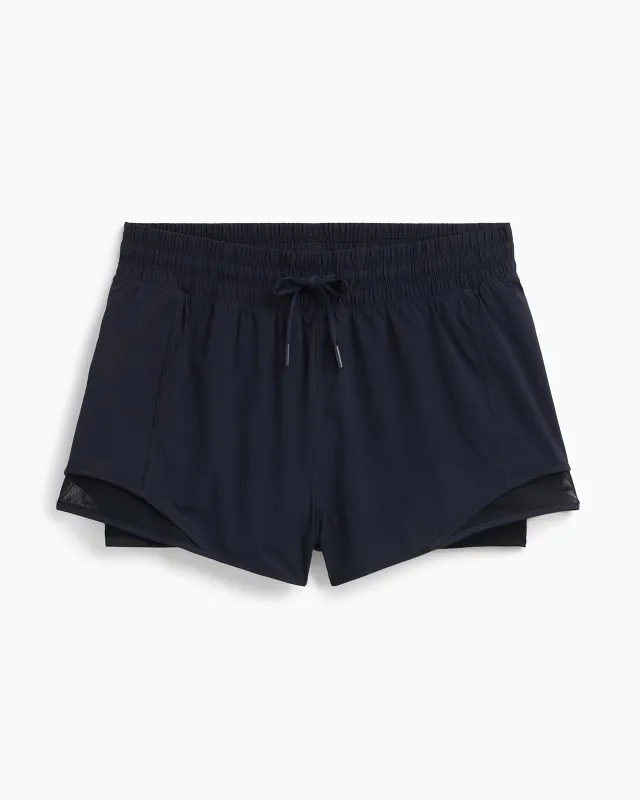 The Built-In Compression GRS Certified Recycled Poly Run Short - Black sold by Mondetta