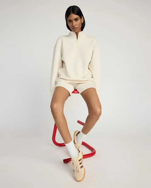 The Warm + Soft GRS Certified Recycled Polyester Mélange Half Zip - Htr Birch sold by Mondetta