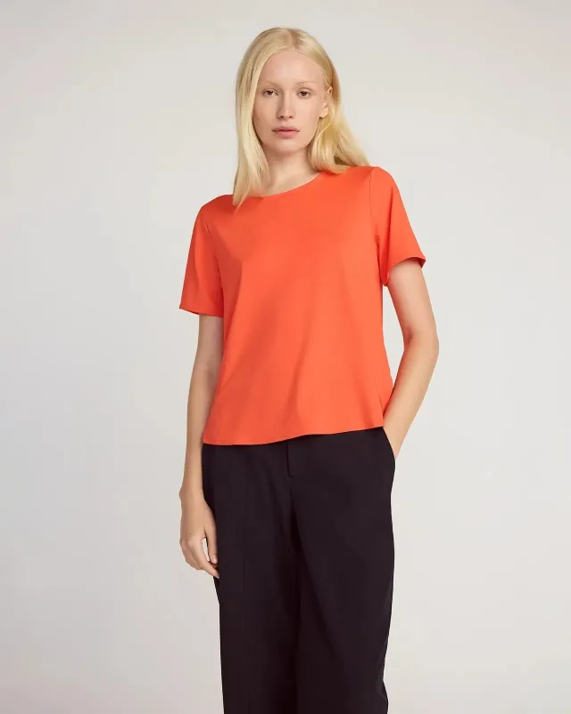 The Active Stretch GRS Certified Recycled Nylon Side Slits Tee - Cherry Tomato sold by Mondetta