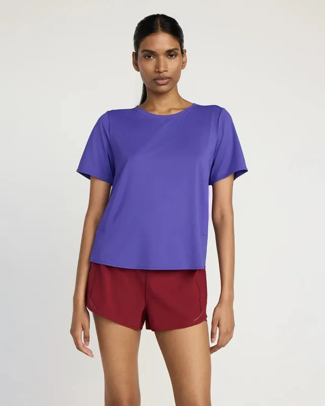 The Active Stretch GRS Certified Recycled Nylon Side Slits Tee - Deep Blue sold by Mondetta