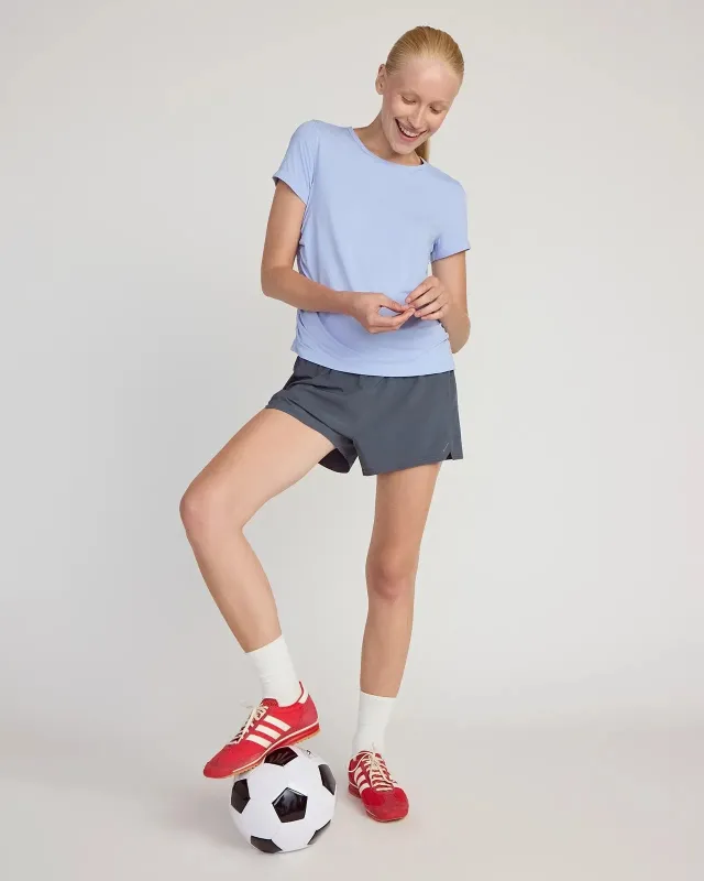 The Breathable GRS Certified Recycled Nylon Ruched Tee - Blue Heron sold by Mondetta