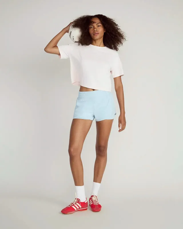 The Breathable GRS Certified Recycled Nylon Cropped Tee - Heavenly Pink sold by Mondetta