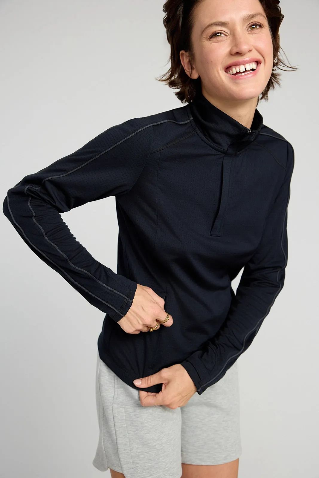 The Run Active GRS Certified Recycled Poly 1/4 Zip Top - Black sold by Mondetta