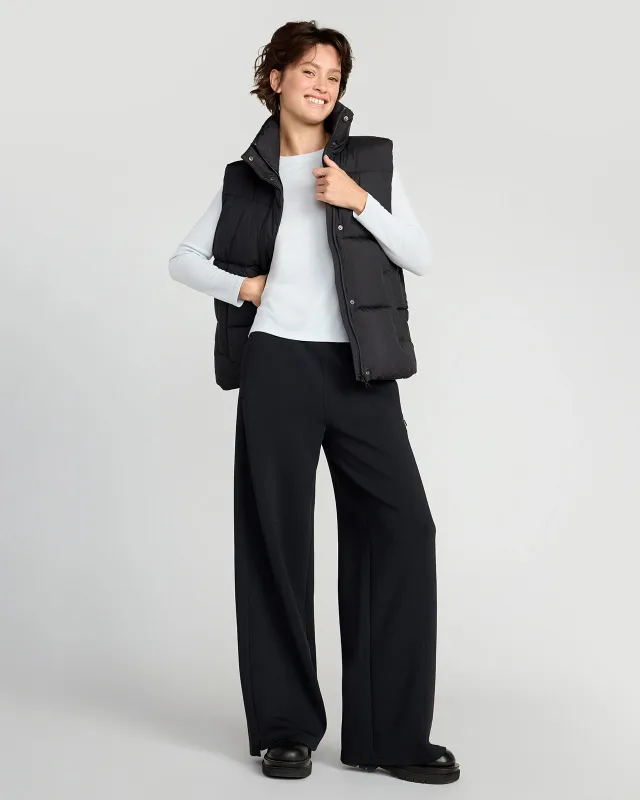 The Sorona™ Fill GRS Certified Recycled Poly Puffer Vest - Black sold by Mondetta