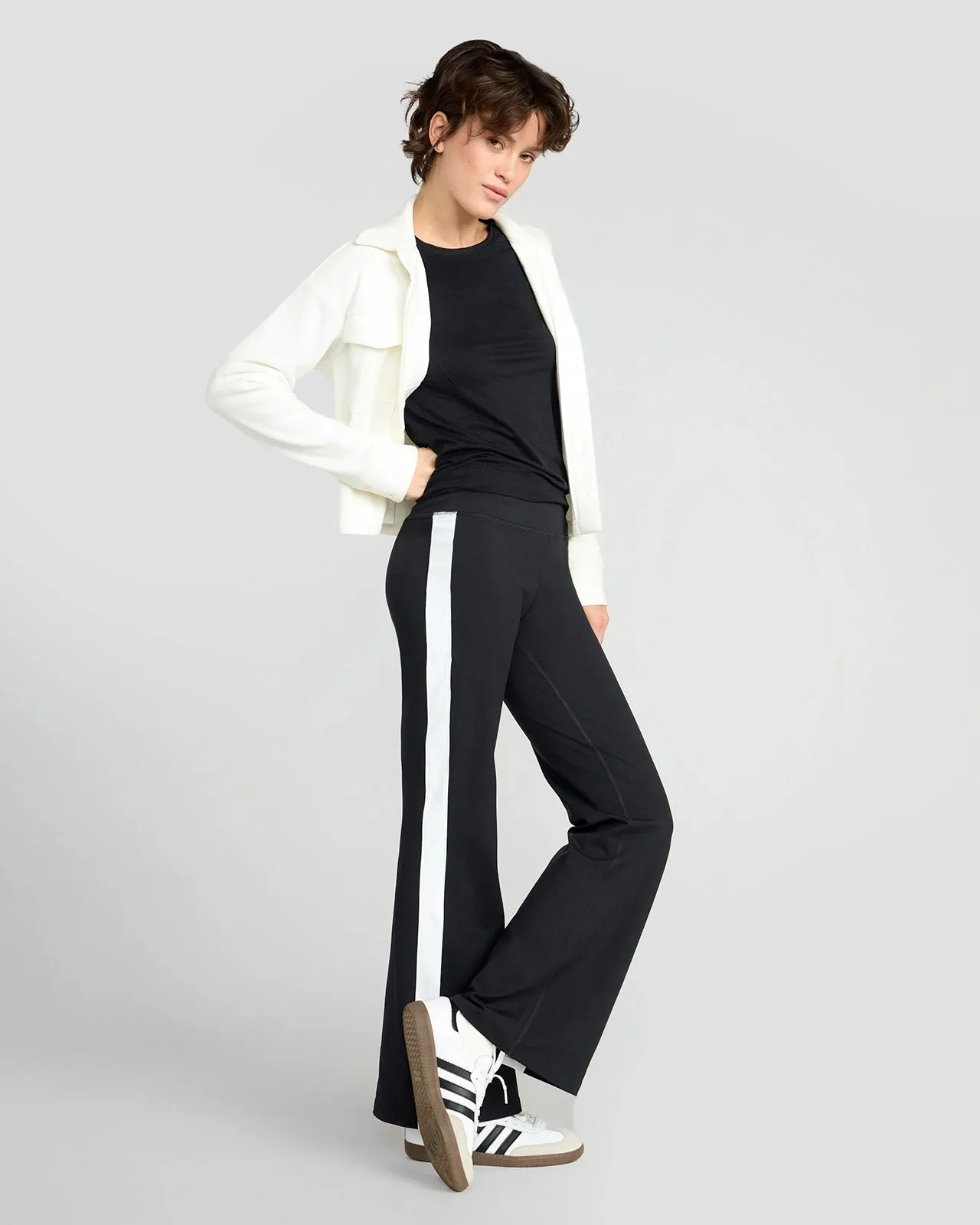 The Stretch GRS Certified Recycled Poly Flared Pant - Black/White sold by Mondetta