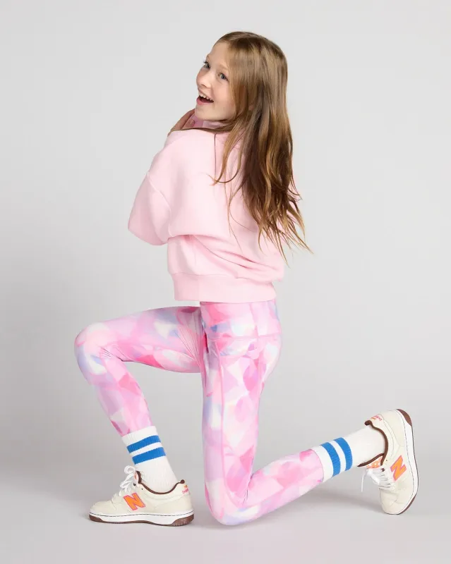 The Girls' Active Stretch GRS Certified Recycled Poly 7/8 Legging - Abstract Pink sold by Mondetta
