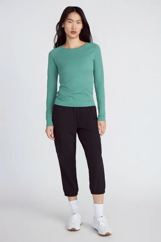 The Stretch Seamless GRS Certified Recycled Nylon Long Sleeve - Deep Sea Green sold by Mondetta