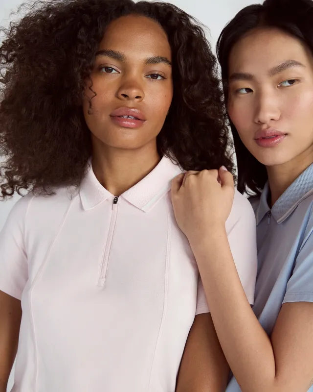 The Stretch Pique GRS Certified Recycled Nylon Polo - Potpourri Pink sold by Mondetta