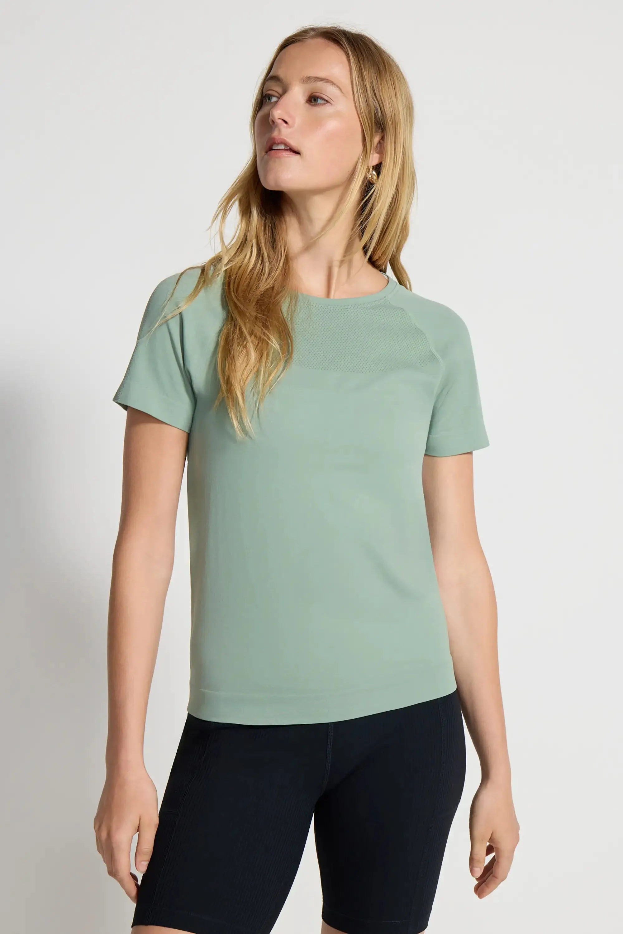 The Stretch Seamless GRS Certified Recycled Nylon T-Shirt - Muted Green sold by Mondetta