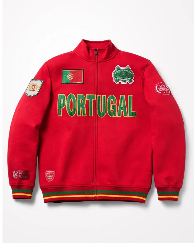 The Pitch World Jacket - Pitch Red/Portugal made by Mondetta