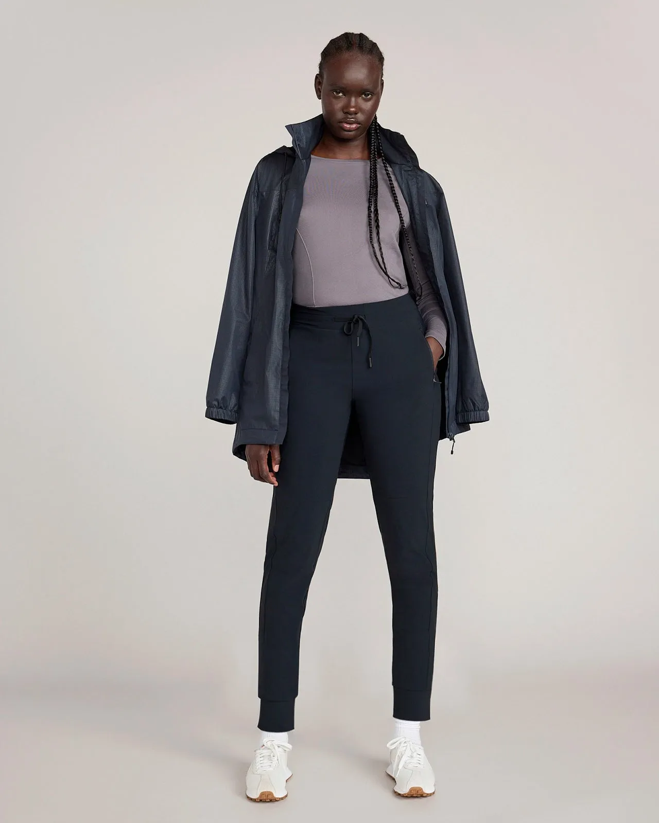 The Soft Stretch GRS Certified Recycled Nylon Carrot Leg Jogger - Black sold by Mondetta