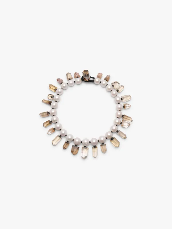 Necklace: pearls, mountain crystal, ruthilated quartz sold by Monies