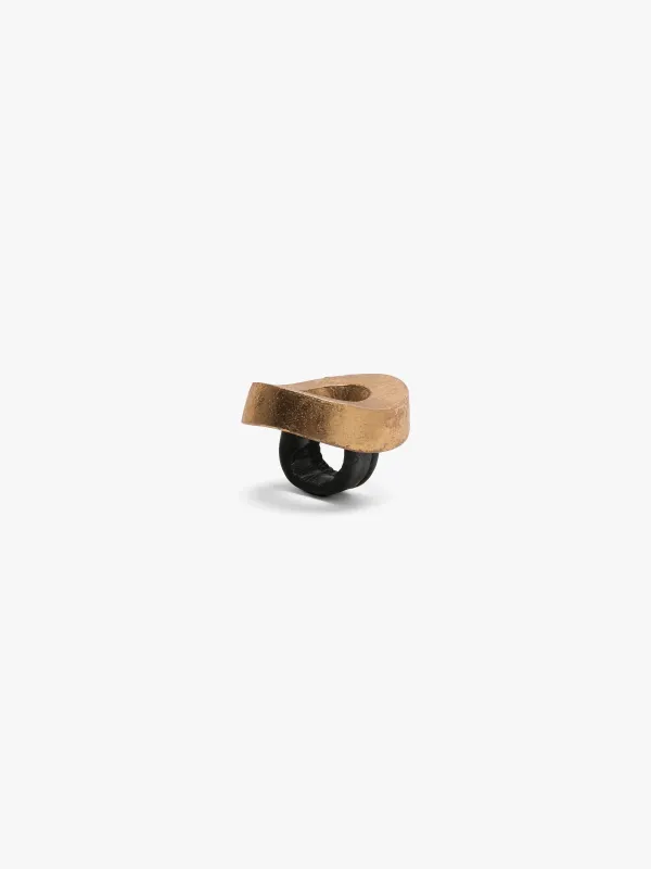 Elowen ring: acacia, goldfoil, leather sold by Monies