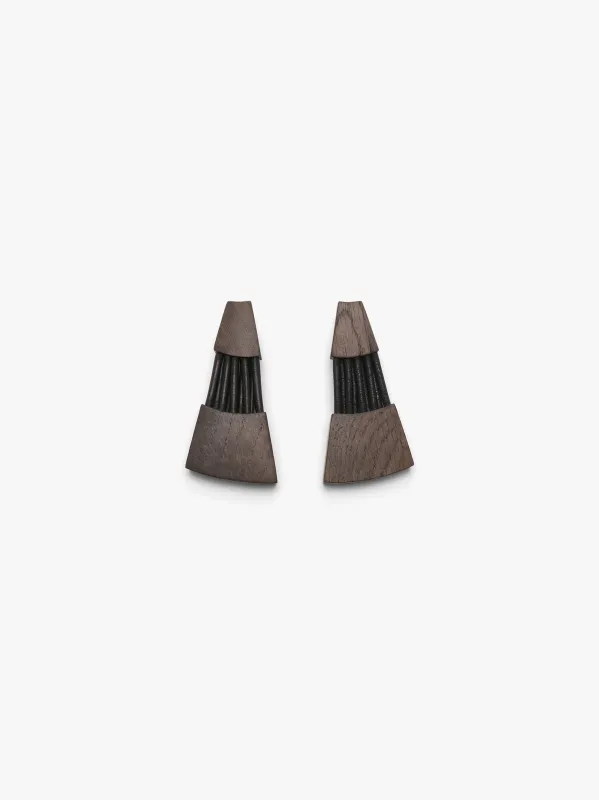 Bolira earrings:  bog oak, leather sold by Monies