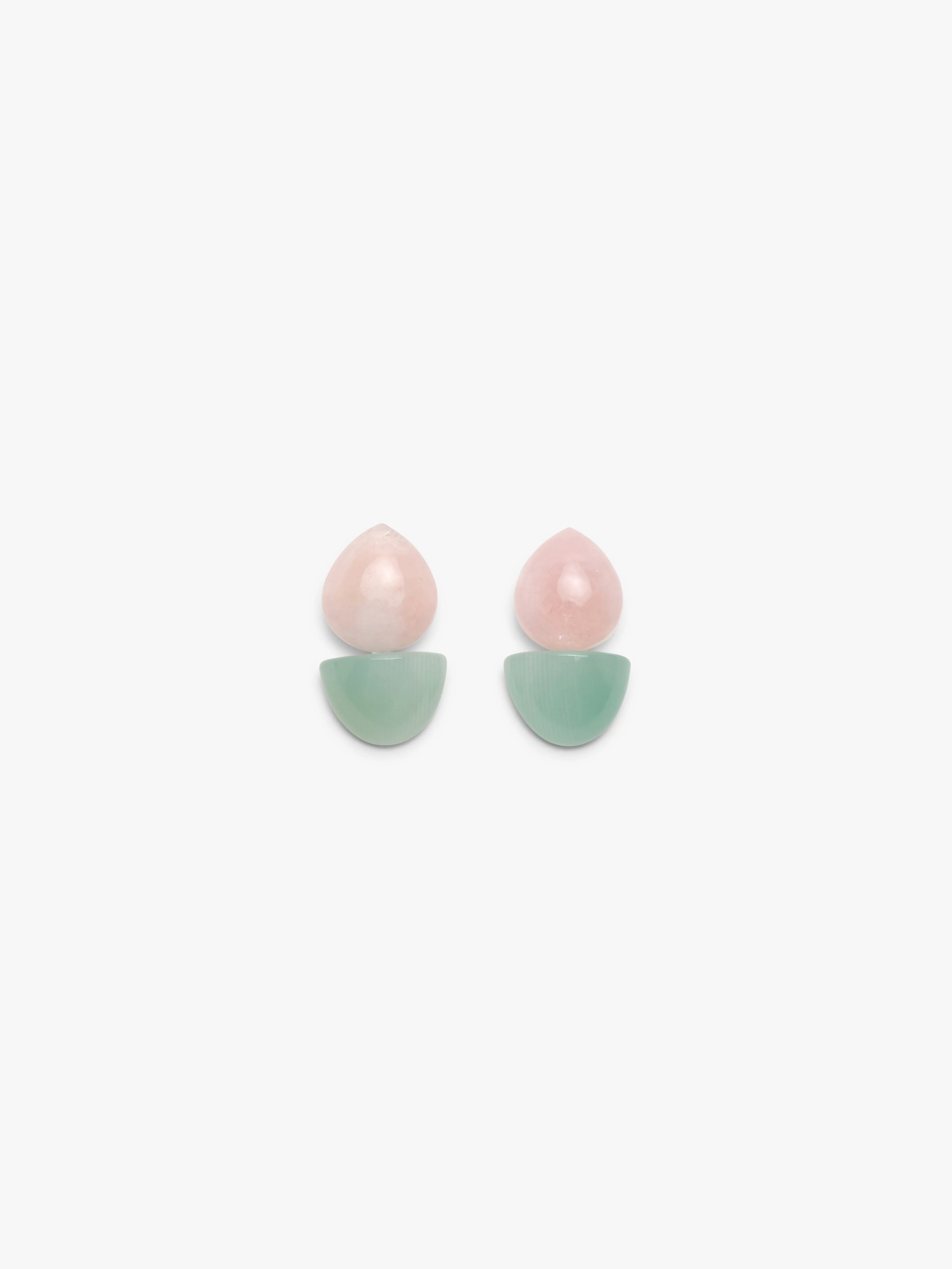 Earrings: calcite, rosequartz sold by Monies