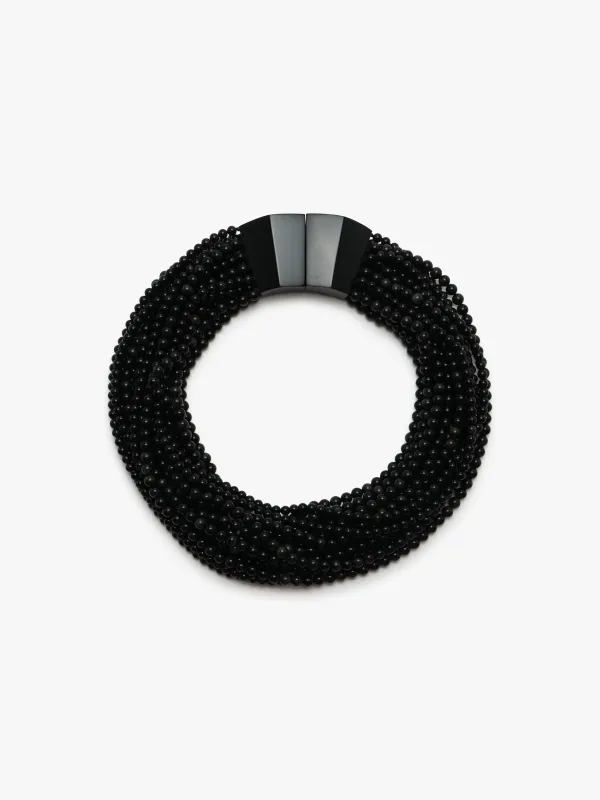 Kaia necklace: obsidian stone, acrylic sold by Monies