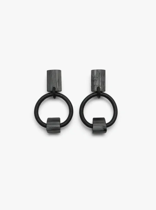 Jointure earclips: black tourmaline, leather sold by Monies