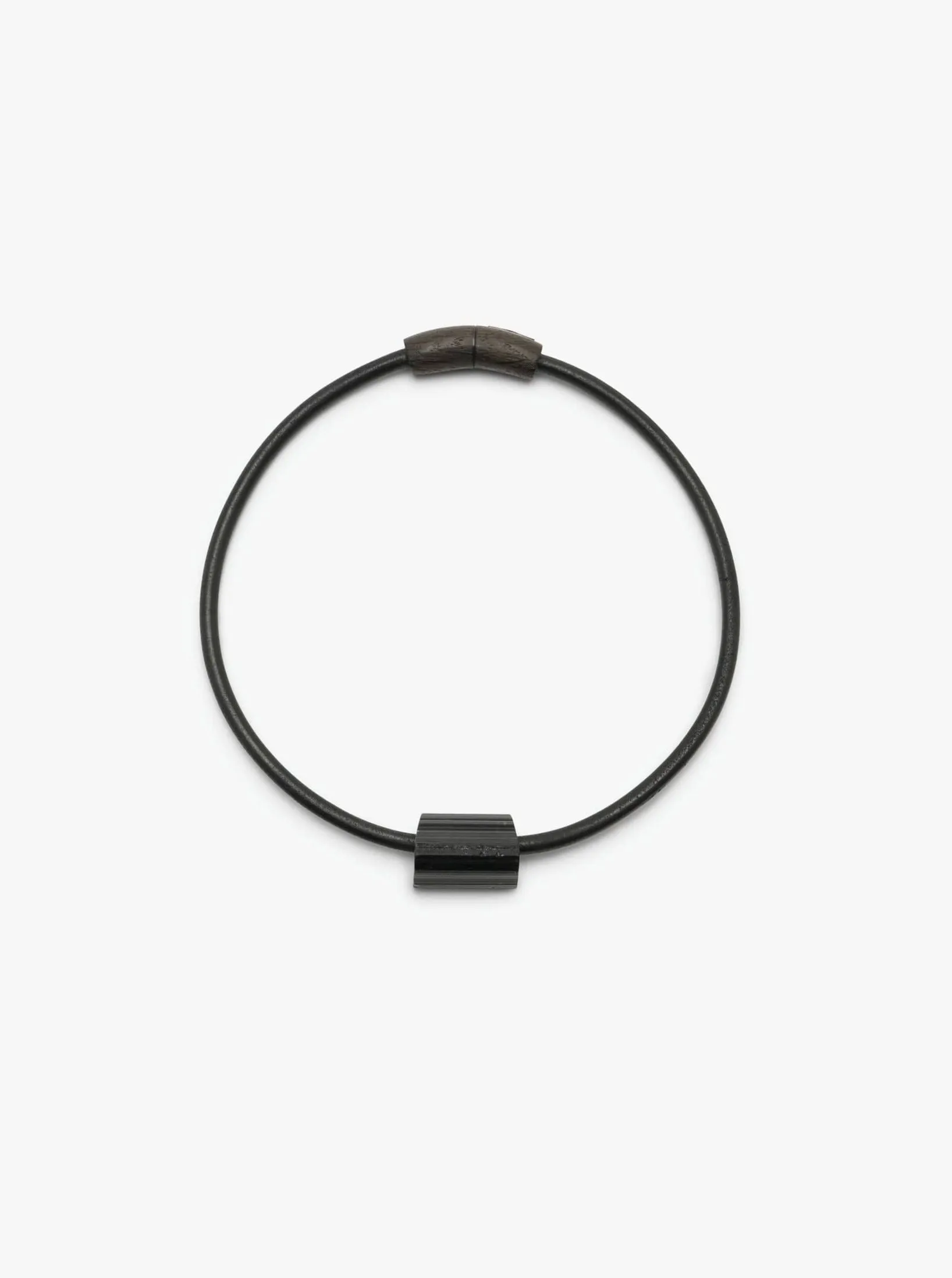 Mint necklace: leather, bog oak, tourmaline sold by Monies