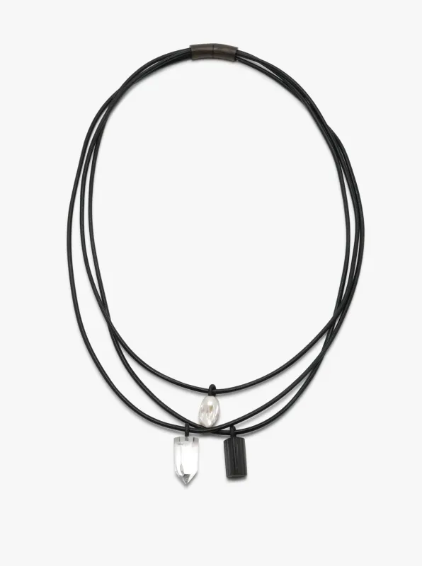 Mint necklace: leather, bog oak, baroque pearl, tourmaline, mountain crystal sold by Monies