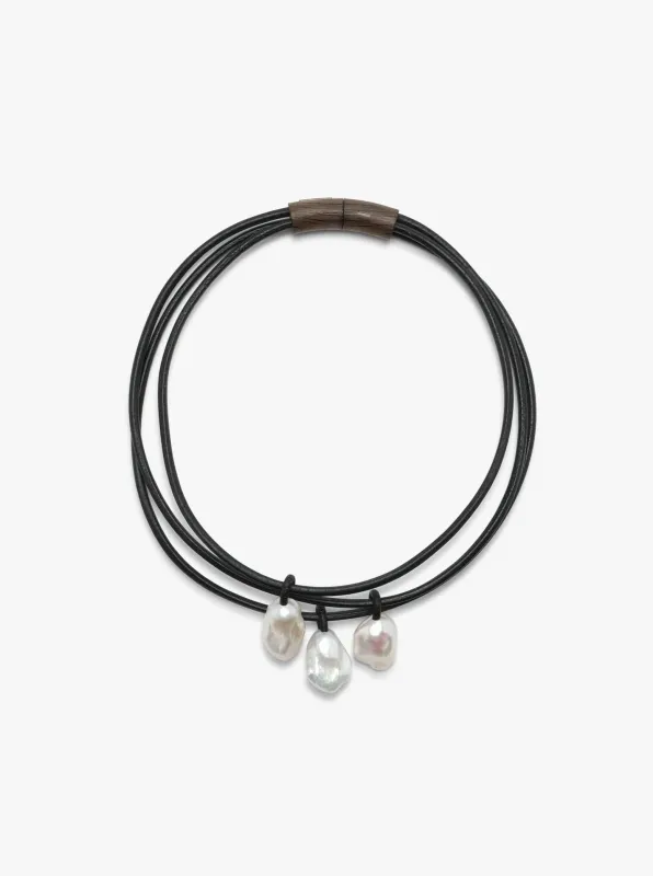 Mint necklace: leather, bog oak, baroque pearl sold by Monies