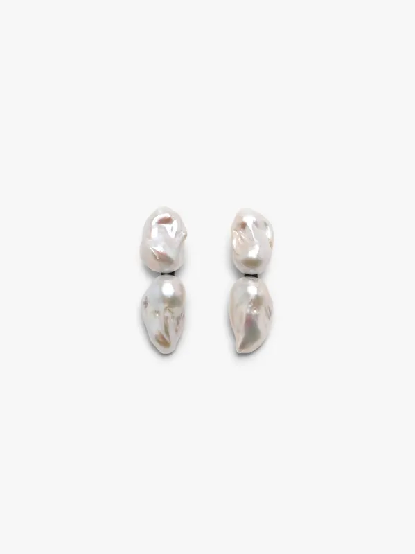 Sable earrings: double baroque pearls sold by Monies