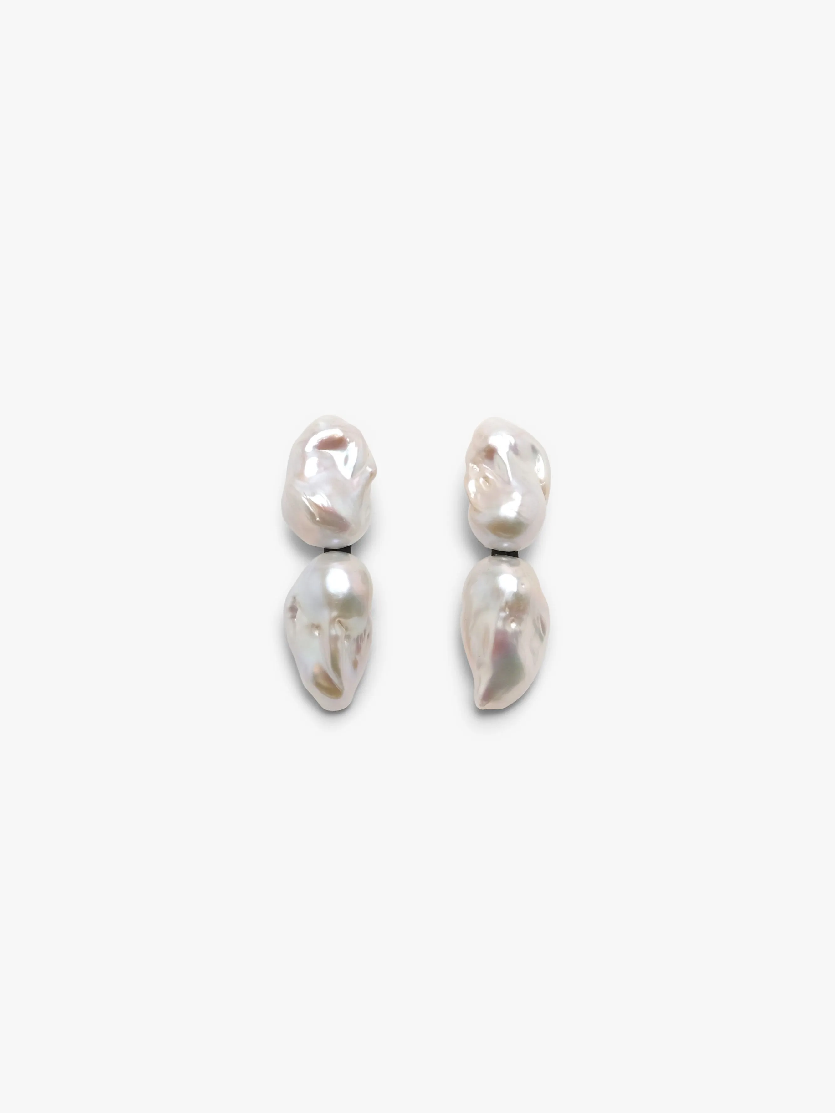 Sable earrings: double baroque pearls sold by Monies