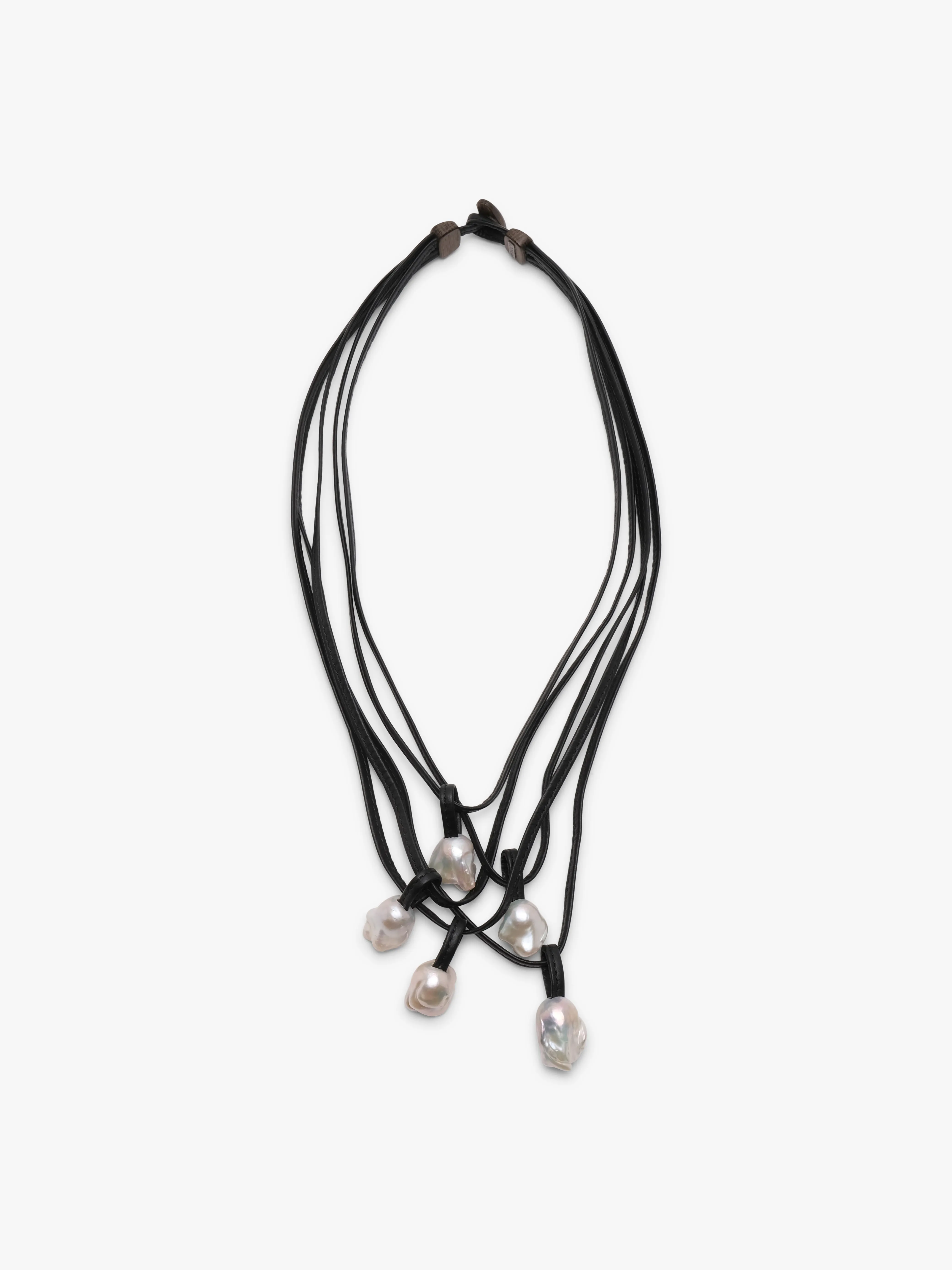 Mint necklace: baroque pearls, leather sold by Monies