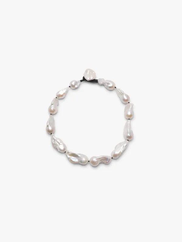 Necklace: baroque pearls sold by Monies