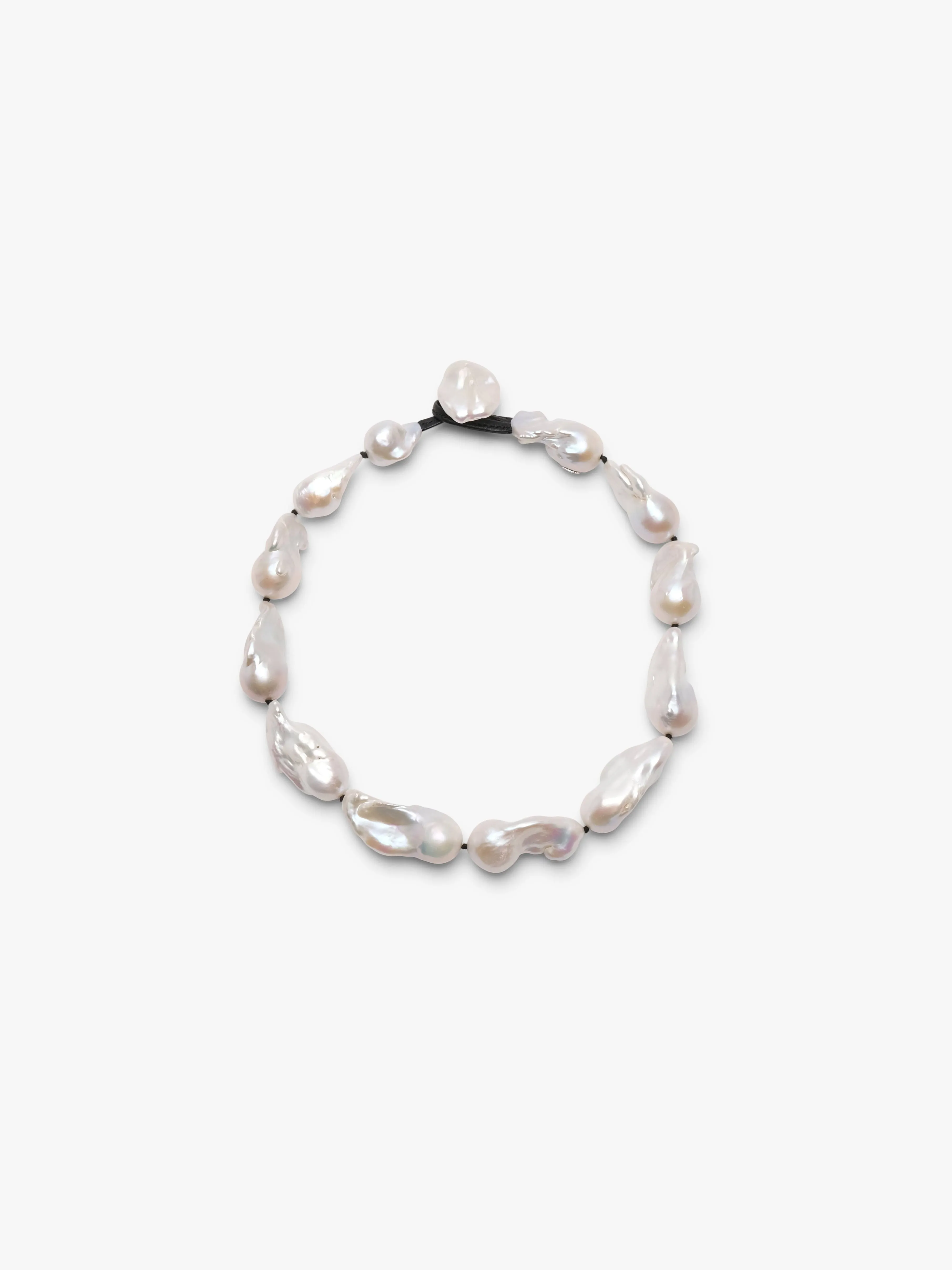 Necklace: baroque pearls sold by Monies