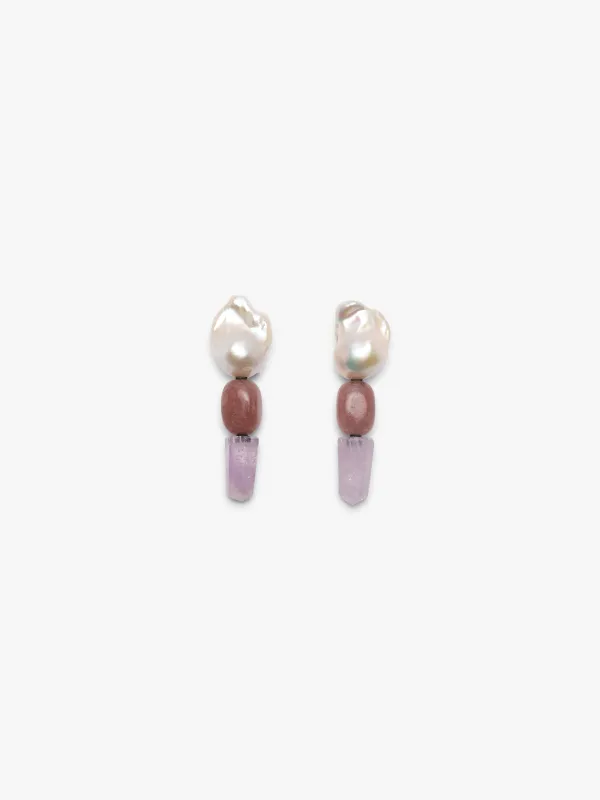 Earrings: amethyst, pearl, quartz sold by Monies