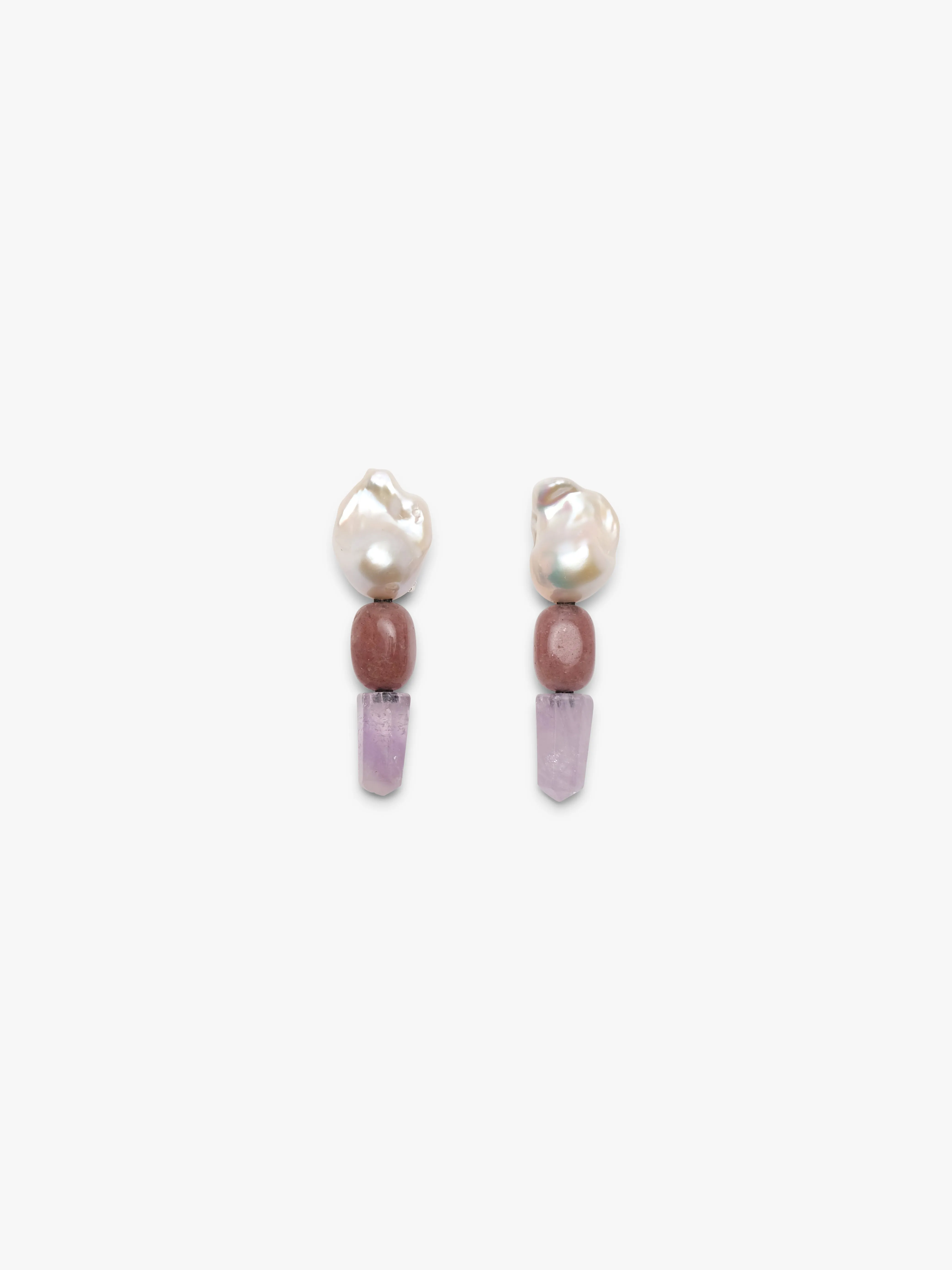 Earrings: amethyst, pearl, quartz sold by Monies