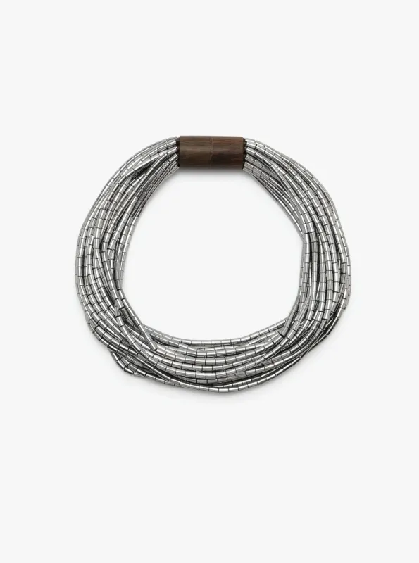 Ember necklace: hematite stone sold by Monies